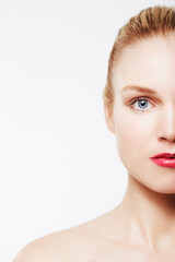 Fototapeta premium Portrait, beauty and woman in red lipstick, makeup and cosmetics in studio isolated on a white background. Face, model and skincare in spa facial treatment for wellness, healthy glow and mockup space