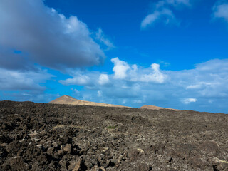 Spectacular views of the Fire Mountains at Timanfaya National Park, this unique area consisting entirely of volcanic soils. A Mars-like volcanic landscape in a sea of ​​lava. Lanzarote, Canary Island