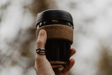 hand holding a bottle