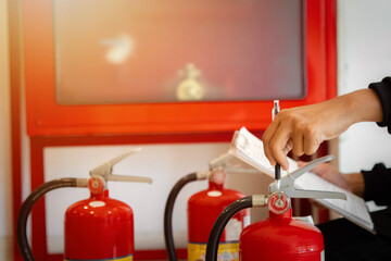 Engineer check fire suppression system,check fire extinguisher tank in the fire control room for...