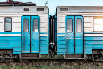 Double closed automatic doors of blue suburban train