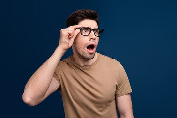 Photo of shocked impressed stylish man open mouth look empty space unexpected unbelievable offer...