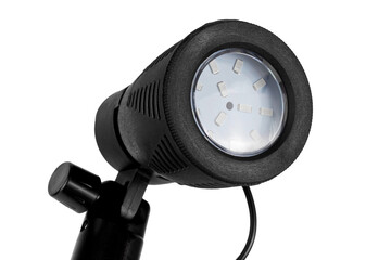 a constant light source powered by an electric grid, a studio lamp for shooting objects, a lantern