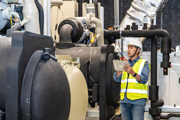 asian man factory technologist. Industrial worker. Chemical plant specialist.