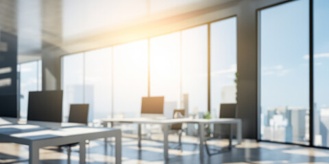 Sunny blurred background of a light modern office interior with panoramic windows
