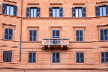 Facade details of beautiful old buildings in the center of Rome, Italy