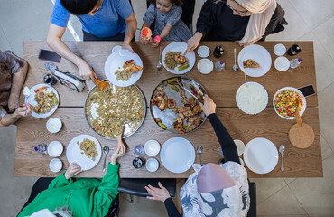 multi generation family eating together with grandfather