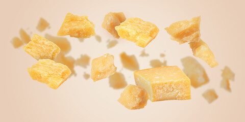 Tasty parmesan cheese falling on dark beige background. Banner design