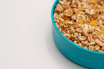 Puffed wheat and unsweetened corn in a bowl. Healthy vegan breakfast