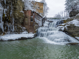 Winter abandoned Mill at Wells Falls, Businessman's Lunch Falls, on Six Mile Creek Ithaca, NY.