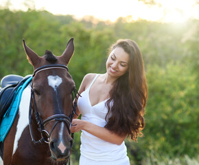 Fototapeta premium Beautiful woman and a horse