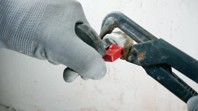 The work of a plumber with a special tool.