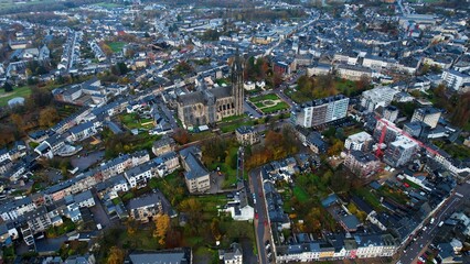 Aerial around the city Arlon in Belgium on a cloudy afternoon in later fall.