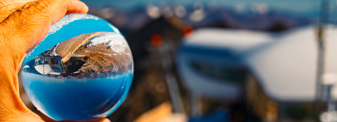 Crystal ball alpine summer landscape shot at Wildspitzbahn cable car, Pitztal Glacier, Imst, Tyrol, Austria