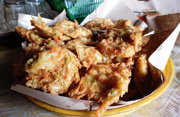 Bakwan is a fried food made from vegetables and wheat flour. Bakwan usually refers to fried vegetable snacks that are usually sold by traveling vendors