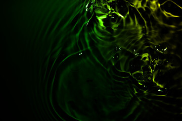 The water waves are green and black.