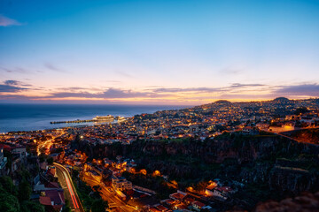 Sunset view from the hills of Madeira harbour in Portugal