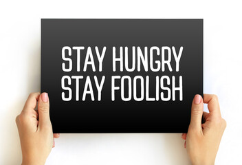 Stay Hungry Stay Foolish text quote, concept background