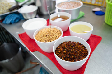 Thai Condiment Sets in large white bowl