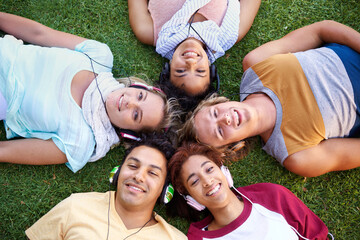 Headphones, portrait or friends in park at college, campus or together with community, smile or group. University, above or happy people bond with support, joy or radio music in education in garden - obrazy, fototapety, plakaty