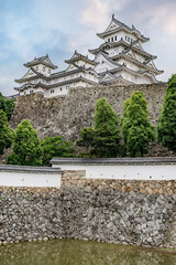 Himeji Castle in Japan.
Immense castle seen with a monumental perspective.