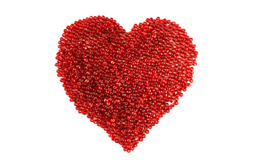 Heart made of red beads on an isolated white background.