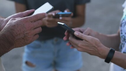 Phone, hands or people on social media in circle to share, info or news on online communication together. Networking, outdoors or closeup of family in community or group with mobile app or technology