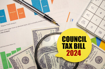 COUNCIL TAX BILL 2024 on yellow sticker with pen and calculator