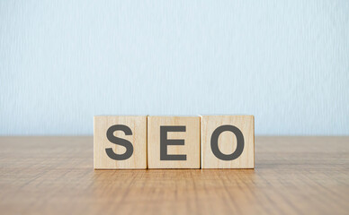 SEO word on ordered block cubes, website or search engine optimization idea, wooden block cubes...