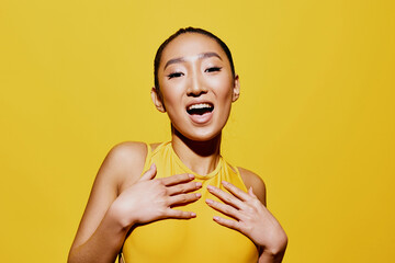 Summer woman fashion trendy person smile closeup black swimsuit face portrait surprised yellow beauty