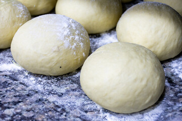 Fototapeta na wymiar Close-up of a dough for a pizza.