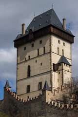 Fototapeta na wymiar Historical wall and tower of the historical Karlstejn castle. 