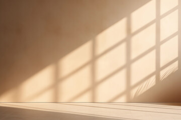 Geometric shadows on a warm beige wall. Soft beige room with sunlight creating a grid of shadows