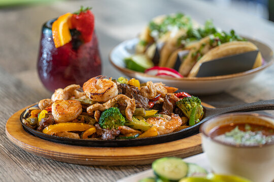 shrimp and seafood fajitas on skillet