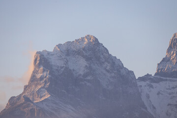 Sunrise at a Snow-Capped Mountain Peak Overlooking Canmore, Alberta
