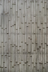 Weathered bamboo Japanese wall.
Bamboo wood fences are used to separate built constructions.