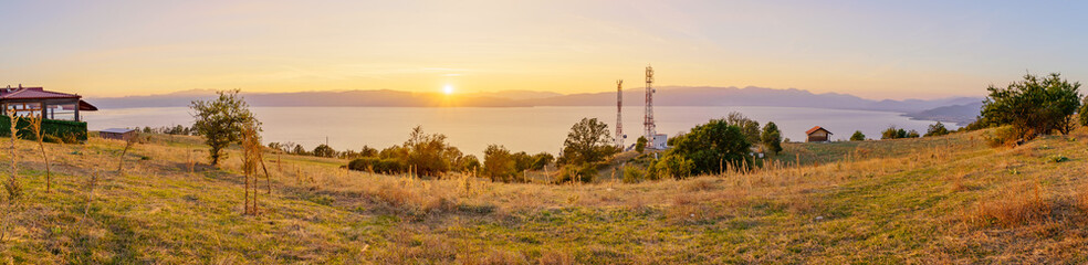 Panoramic sunset view of Lake Ohrid - obrazy, fototapety, plakaty