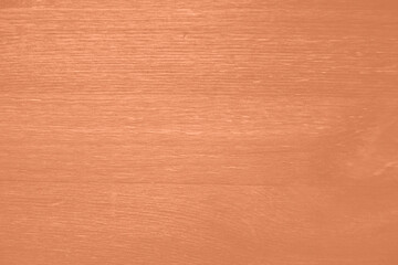 Texture of Peach fuzz wooden boards. Grunge texture old wood. Peach fuzz color wood texture background surface with old natural pattern. Wood texture background, wood planks. Color trendy 2024.