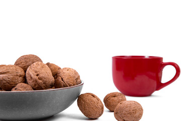 Walnuts are on a plate. Isolate. Ingredients. Diet and weight loss. Vitamins.