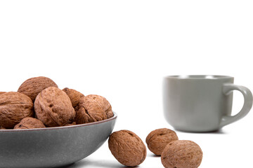 Walnuts are on a plate. Isolate. Ingredients. Diet and weight loss. Vitamins.