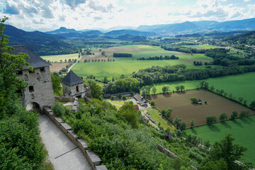 Fototapeta na wymiar Idyllic and iconic austrian landscape: wonderful panoramic view into surrounding landscape from Castle Hochosterwitz in Carinthia in Austria