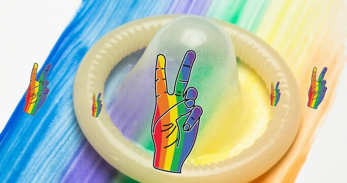 Animation of rainbow hands and pride texts over condom on rainbow background