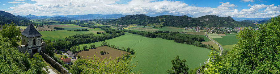 Fototapeta na wymiar Idyllic and iconic austrian landscape: wonderful panoramic view into surrounding landscape from Castle Hochosterwitz in Carinthia in Austria