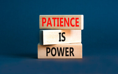 Patience is power symbol. Concept words Patience is power on beautiful wooden blocks. Beautiful grey table grey background. Business and patience is power concept. Copy space.