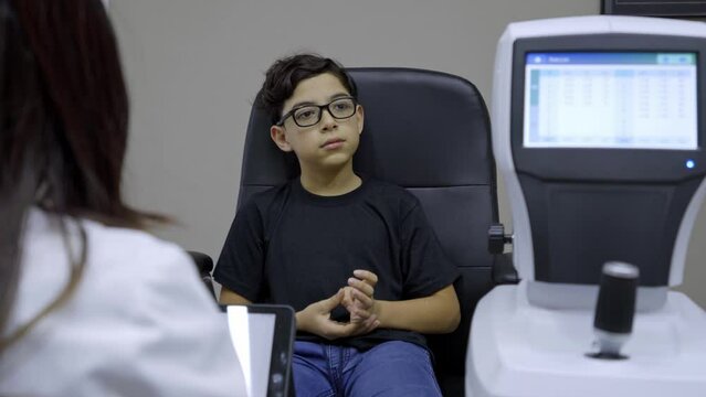 Child with autism listening to his doctor 