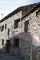 Beautiful houses in Patones de Arriba, Madrid. Traditional stone walls