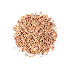 Many dry buckwheat grains isolated on white, top view