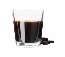 Shot glass with coffee liqueur and beans isolated on white