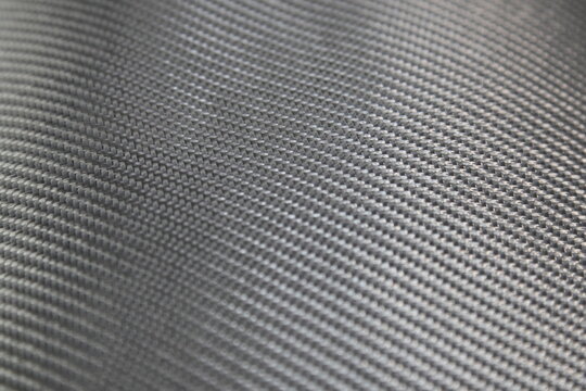 Black Kevlar sheet fibre glass Fabric surface for background texture