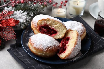 Delicious sweet buns with cherries on table, closeup